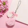 Nuevo Llavero Colgante de Lazo de Cinta de Bola de Pelo Rosa Accesorios de Corazón de Niña Amor Hueco Accesorios para Funda de Teléfono Móvil