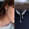 Estilo Coreano Nueva Llegada Alas de Ángel Diamante Asimétrico Aretes de Borla para Mujer Largos Plata Chapada Pin para la Oreja Aretes Elegantes de Moda