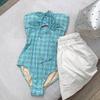 Suministro transfronterizo al por mayor estilo ins Corea del Sur retro simple cuello de tubo para el pecho traje de baño de una pieza para el pecho traje de baño para mujer