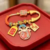 2026 Ano do Cavalo Em Estoque Fio Vermelho Dourado Broche Anti-Assustar Segurança do Bebê Broche Calmante para Gestantes Broche Criativo
