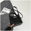 Bolso Cubo de Mano de Nicho Estilo Coreano para Mujer 2026 Primavera Nuevo Moda Bolso de Hombro Único Bolso Cruzado Simple de Alto Valor