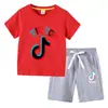 Nueva Camiseta de Verano 2026 para Niños Ropa Infantil de Comercio Exterior Estilo Coreano Ins Algodón Manga Corta y Pantalones Cortos Conjunto de Dos Piezas para Niños