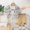 2025 Novo Estilo de Verão Camisa com Estampa Completa Gola Roupas de Verão 1-4 Criança Bebê Manga Curta Moda Conjunto de Três Peças Tendência Venda Direta