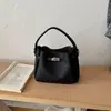 Bolso de mano de diseño nicho estilo coreano para mujer 2026 nuevo diseño transfronterizo bolso madre-hija bolso de hombro cruzado PU