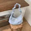 Bolsa de Axila Estilo Coreano de Nicho Nova Primavera Bolsa de Mão Plissada com Laço para Mulheres Bolsa Nuvem de Ombro Único