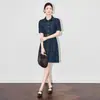 2504501-Shenzhen Nanyou Retro Estilo Hong Kong Diseño de Moda Solapa Estilo Francés Falda de Mezclilla Verano para Mujer Nuevo Estilo