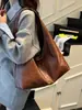 Bolso grande de capacidad vintage transfronterizo para mujer, nuevo bolso casual de nicho para el verano de 2026, bolso de hombro bajo el brazo, bolso tipo dumpling para ir al trabajo