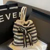 Bolso de punto de gran capacidad transfronterizo, bolso de mano elegante para mujer, nuevo modelo de otoño 2026 versión coreana, bolso simple de hombro y cruzado