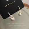 Pendientes de circonita con perlas de imitación para mujer, elegantes y exquisitos, con hebilla, a la moda, combinables con todo, 2025