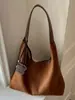 Bolso de cubo tejido de gran capacidad de moda, nuevo bolso de hombro para principios de otoño 2026, bolso tote elegante para el trabajo y los desplazamientos