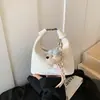 Bolso Pequeño de Alta Gama Transfronterizo para Mujer Nuevo Primavera 2026 Versátil Bolso de Hombro para Debajo del Brazo Popular Bolso Cruzado Tipo Empanada