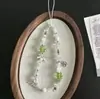 Cadena Minimalista para Teléfono con Perlas y Lazo, Correa de Muñeca, Cadena de Mano, Portacámaras y Llavero para Mujer