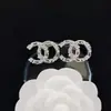 Pendientes de alta calidad para todo tipo de atuendos, pendientes de moda para hombres y mujeres, letras de pedrería, todo a juego, pasador de plata s925, accesorios de aleación