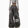 Pantalones casuales de pierna recta para mujer, estilo retro americano 2026 con estampado de calavera y estampado de leopardo, nuevo estilo de otoño con dobladillo deshilachado, elegantes