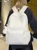 Mochila de estilo minimalista de alta gama con estampado de estrellas en tonos oscuros, refrescante y juvenil estilo americano, adecuada para estudiantes para la escuela y salidas, mochila escolar moderna y genial