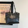 2026 Otoño Temprano Nueva Bolsa de Tote de Gran Capacidad Viaje Urbano Textura de Nicho Bolso de Hombro para Viaje al por Mayor Bolsa para Mujer