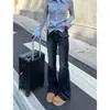 Jeans Negros de Micro-Campana Estilo Urbano Americano Otoño 2026 Chica Picante Nuevo Estilo Cintura Baja Adelgazantes Elásticos de Campana