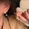 Pendientes de Lazos Microincrustados de Circonita de Venta Caliente Estilo Coreano 2026 para Mujer, Aguja de Plata S925, Pendientes de Perla de Botón de Gama Alta Nicho