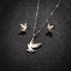 Otoño e invierno nuevo estilo coreano personalizado acero inoxidable águila pájaro paloma colgante collar aretes juego de joyas de tres piezas