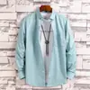 Taobao comercio exterior al por mayor para hombre color liso moda manga larga actividades moda casual para hombres jóvenes ropa de pulgada
