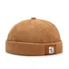 Gorra sin visera de pana para hombre y mujer, moda callejera de otoño e invierno, gorro de cúpula cálido con personalidad, gorra melón, gorro para el frío