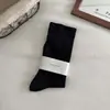 Calcetines de mujer sin costuras para primavera y otoño, calcetines blancos postparto de caña suelta, calcetines holgados de color liso estilo japonés, calcetines largos minimalistas