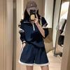Conjunto deportivo informal de moda con cuello tipo polo para mujer, primavera y verano 2024, pantalones cortos de pierna ancha, conjunto de dos piezas a la moda