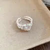 Anillo abierto de doble capa con forma de corazón plisado, incrustaciones de circonita, chapado en oro real de 18 quilates, joyería exquisita de nicho de alta gama