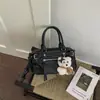 Bolsa Quadrada Pequena Fashionável Transfronteiriça para Mulheres 2026 Nova Exquisita Estilo Coreano Tendência Casual Bolsa de Ombro e Bolsa Transversal para Mulheres