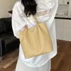 Bolsa Elegante com Padrão Trançado Feminina 2026 Nova Simples Grande Capacidade para o Dia a Dia Bolsa de Ombro Bolsa Tote de Balde de Alta Qualidade