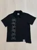 Camiseta de Verão Manga Curta Estilo Ins Transfronteiriço com Caveira de Strass Escuro, Design com Fivela Metálica Lateral e Gola Reversível, Top de Caimento Solto