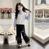 2026 Novo Conjunto de Duas Peças para Primavera e Outono Estilo Universitário Moletom de Manga Longa Calça Longa de Perna Larga Casual Solta Xadrez