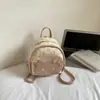 Mochila súper popular de gato lindo para mujer, nueva moda 2026 mochila versátil de PU con cara de gato para viajes y salidas
