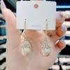 Wang frito transmisión en vivo nueva moda aretes de perla color champán Corea del Sur temperamento aretes de celebridad de internet aretes de ambiente de moda