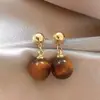Brincos de Pedra Olho de Tigre para Outono e Inverno para Mulheres, Nicho de Luxo Leve, Estilo de Alta Qualidade, Novos Tarraxas de Orelha Retrô Únicas