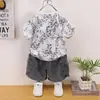 Conjunto de Verano para Niños Niños 2026 Nueva Moda de Verano Estiloso Estilo Coreano Estampado de Leopardo Letra Delgado Conjunto de Dos Piezas Moderno