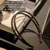 Faixa de Cabelo Estilo Coreano Retro Estampa de Leopardo para Mulheres Fashionável Design de Nicho Elegante 2026 Novo Prendedor de Cabelo Faixa de Cabelo Acessórios de Cabelo Penteadeira
