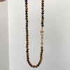 Collar con hebilla de herradura de piedra Ojo de Tigre luz de lujo alta calidad dulce fresco casual cadena para clavícula estilo frío elegante cadena para suéter
