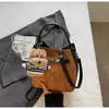 Bolso de Hombro Versátil de Alta Gama Bolso de Mano para Mujer 2026 Nuevo Bolso Cubo Retro Bolso Cruzado Simple de Otoño e Invierno