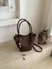 Bolso Cubo Tejido Estilo Coreano INS Súper Popular Transfronterizo para Mujer 2026 Nuevo de Gama Alta Versátil para el Trabajo Bolso de Hombro Único Cruzado