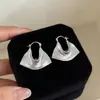 Elegante HerederaEstilo Fresco Bolso de Lunares Plateados Arete Arete Único Mujer 2026 Aretes Súper Hermosos