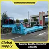 Fabricante Original Exporta Semirremolque de Plataforma Baja de 4 Ejes de Alta Resistencia, Remolque para Transporte de Maquinaria de Ingeniería a Sudamérica, Asia Central y Arabia Saudita