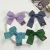 Accesorio para el pelo de clip con lazo de tela con logo y correa de espiga estilo coreano, accesorio para el pelo, juguete para mascotas, ropa de muñeca, accesorios para funda de teléfono