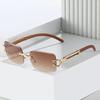 Nuevas gafas de sol sin marco transfronterizas 2023, gafas de sol de hip-hop de metal con estampado de leopardo cuadrado rojo y personalidad europea y americana.