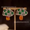 Exquisitos y Versátiles Pendientes Circulares de Piedra Ojo de Gato, Lujo Accesible, Únicos Elegantes, Diseño de Nicho Retro, Pendientes de Segunda Mano Personalizados