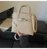 Bolso bandolera versátil estilo francés para mujer, nuevo modelo 2026, diseño de nicho, bolso de mano de alta gama para el día a día, bolso de hombro moderno, a la moda