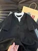 Camiseta de Manga Corta con Cuello en V de Estilo Americano Falsa de Dos Piezas para Mujer, Marca de Tendencia Verano 2026, Versión Coreana, Diseño Holgado, Versátil de Nicho de Media Manga