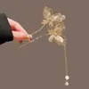 Horquilla de alta gama con forma de U y perla para mujer, nuevo accesorio para el cabello estilo chino, horquilla para la parte posterior de la cabeza, 2025, nueva horquilla para el cabello, tocado