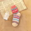 Outono e inverno Novos meias grossas quentes femininas de lã de coelho meias literárias étnicas de caxemira mulheres fabricantes atacado