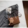 Bolsa Balde Exquisita Estilo Coreano Retrô com Rombos para Mulheres 2025 Nova Versátil Moda para o Dia a Dia Ombro Transversal Cross-Border